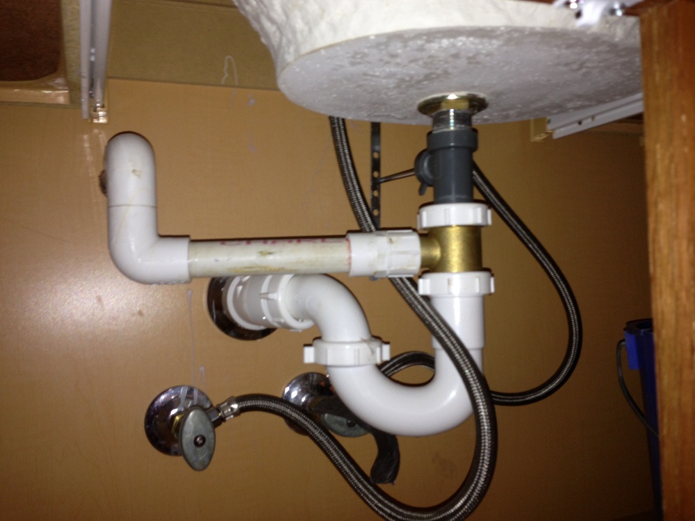 hvac condensate drain line under bathroom sink